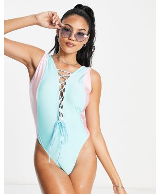 ASOS DESIGN Fuller Bust colour block lace up swimsuit in pink and blue-Multi