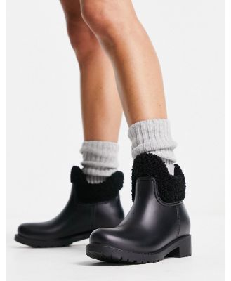 ASOS DESIGN Gold Coast shearling lined chelsea rain boots in black