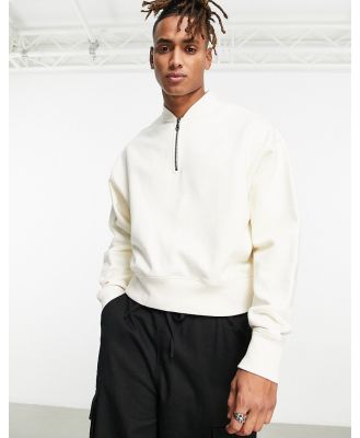 ASOS DESIGN heavyweight oversized sweatshirt with zip detail in off white