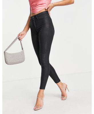 ASOS DESIGN high rise Ridley 'skinny' jeans in coated black