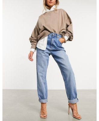 ASOS DESIGN High rise 'Slouchy' mom jeans in midwash-Blue