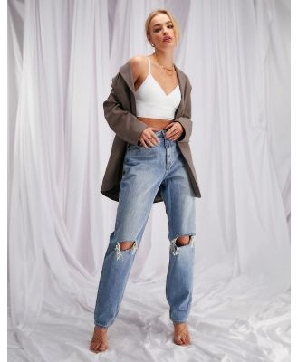ASOS DESIGN high waist 'slouchy' mom jeans in stonewash with rips-Blue