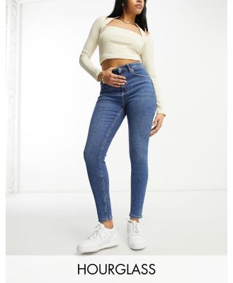 ASOS DESIGN Hourglass ultimate skinny jeans in authentic mid blue