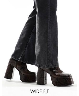 ASOS DESIGN knee high platform heeled boots in snake print faux leather-Brown