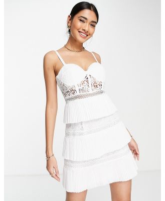 ASOS DESIGN lace corset mini dress with tiered pleated skirt in white
