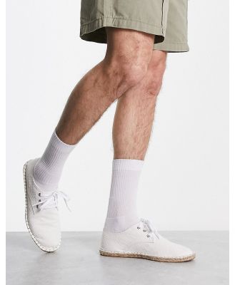 ASOS DESIGN lace up espadrilles in white textured canvas