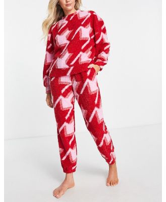 ASOS DESIGN lounge dogtooth borg sweat & trackies set in pink & red-Multi