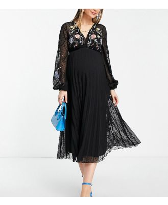ASOS DESIGN Maternity dobby twist front pleated midi dress with all over embroidery in black