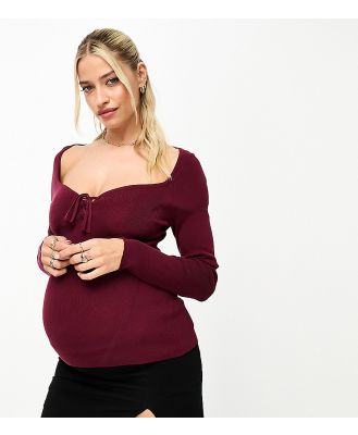 ASOS DESIGN Maternity knitted top with sweetheart neck and lace up front detail in dark red