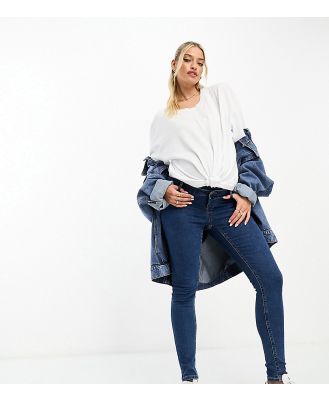 ASOS DESIGN Maternity skinny jeans with over bump in mid blue