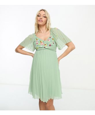 ASOS DESIGN Maternity tie back angel sleeve pleated mini dress with embroidered bust in sage green
