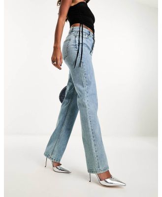 ASOS DESIGN mid rise straight jeans in vintage lightwash-Blue