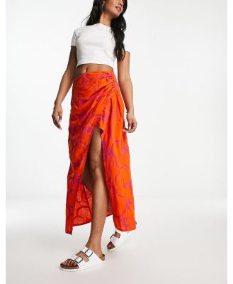 ASOS DESIGN natural slub ruched side midi skirt in orange fruit print