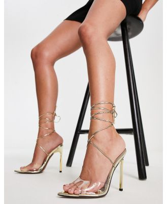ASOS DESIGN Notify pointed insole heeled sandals in clear and gold