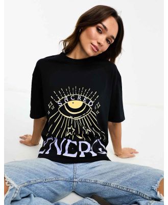 ASOS DESIGN oversized heavyweight t-shirt in sacred energy graphic in black