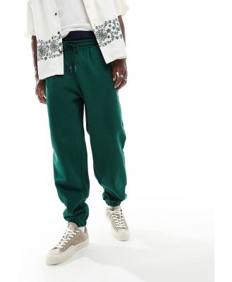 ASOS DESIGN oversized heavyweight trackies in dark green