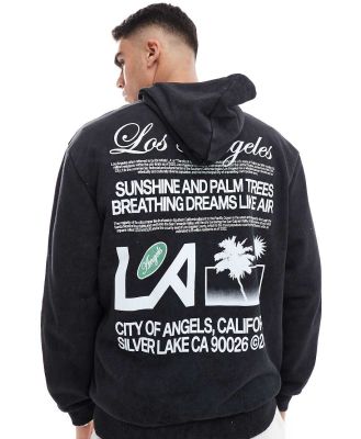 ASOS DESIGN oversized hoodie with Los Angeles text print in washed black