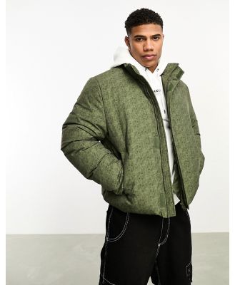 ASOS DESIGN oversized puffer jacket in green wash