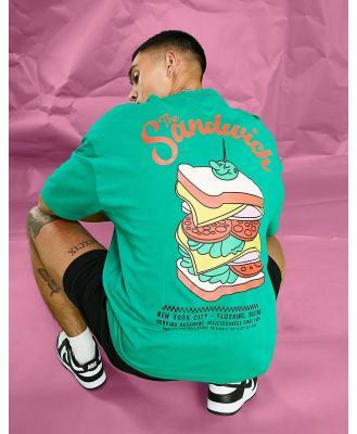 ASOS DESIGN oversized t-shirt in green with sandwich back print