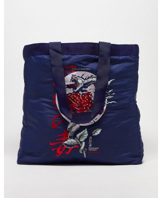 ASOS DESIGN oversized tote bag in navy with dragon embroidery-Blue