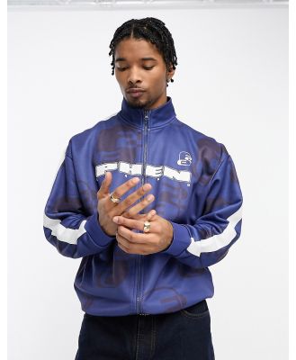 ASOS DESIGN oversized track jacket in navy all over print with taping and high build print