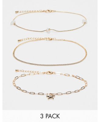 ASOS DESIGN pack of 2 anklets with open link and starfish design in gold tone