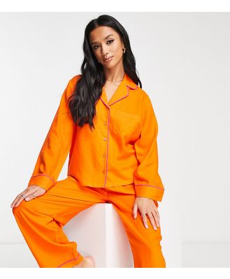 ASOS DESIGN Petite exclusive modal shirt & pants pyjama set with contrast piping in orange-Black