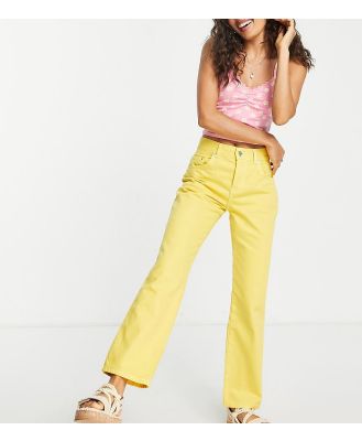 ASOS DESIGN Petite mid rise straight jeans in sunshine yellow