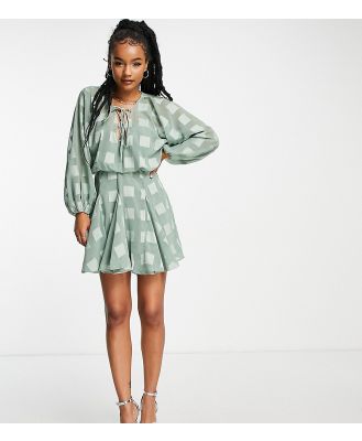 ASOS DESIGN Petite plunge mini dress with godet skirt in sage green