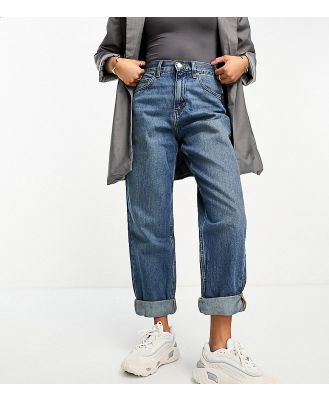 ASOS DESIGN Petite slouchy mom jeans in mid blue