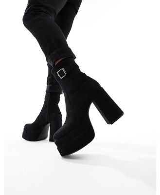 ASOS DESIGN platform heeled boots in black faux suede with buckle detail