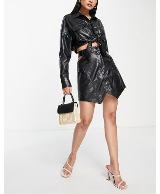 ASOS DESIGN PU skirt with cut out side detail in black (part of a set)