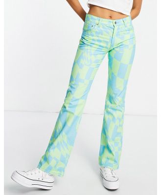 ASOS DESIGN puddle flare pants in psychedelic checkerboard-Multi