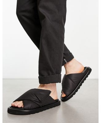 ASOS DESIGN puffer cross strap sandals in black