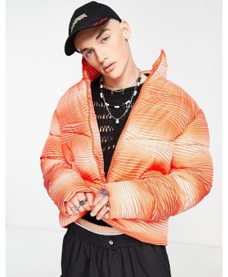 ASOS DESIGN puffer jacket in red and white warp print