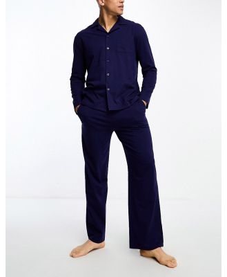 ASOS DESIGN pyjama set with long sleeve shirt and pants in navy jersey