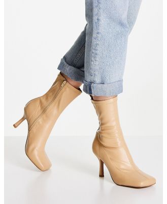 ASOS DESIGN Roma square toe heeled sock boots in camel-Neutral