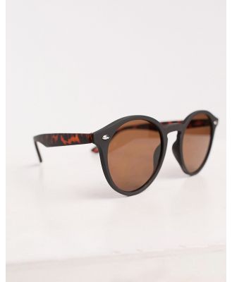 ASOS DESIGN round sunglasses in black with tortoiseshell detail