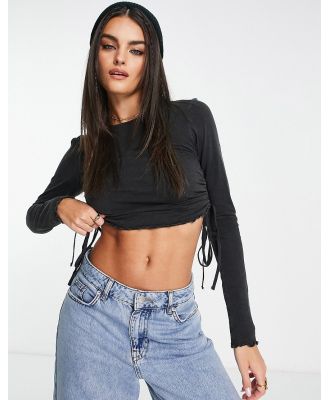 ASOS DESIGN ruched side slubby top in laundry wash in black