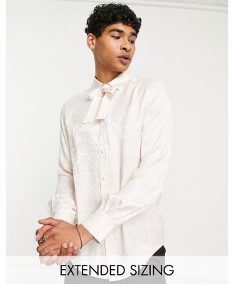 ASOS DESIGN satin jacquard shirt with neck tie in pale pink