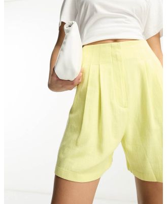 ASOS DESIGN seamed waist shorts with linen in pale lemon-Yellow