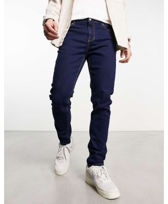 ASOS DESIGN skinny jeans in indigo-Blue