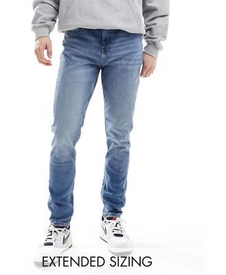 ASOS DESIGN skinny jeans in vintage light wash blue