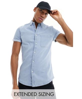 ASOS DESIGN slim roll sleeve denim shirt with button down collar in light blue wash