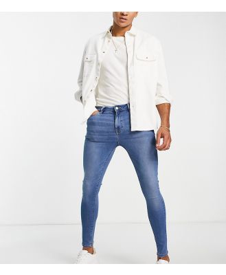ASOS DESIGN spray-on jeans with power stretch in classic wash-Blue