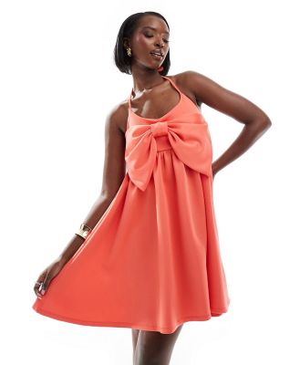ASOS DESIGN strappy babydoll mini dress with oversized bow in coral-Orange
