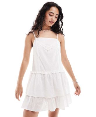 ASOS DESIGN strappy mini lace nightie dress with tiered ruffle skirt in off white