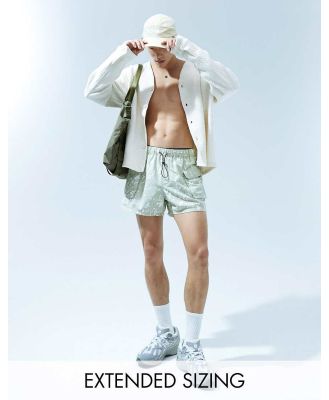 ASOS DESIGN swim shorts in short length with camo print in khaki-Green