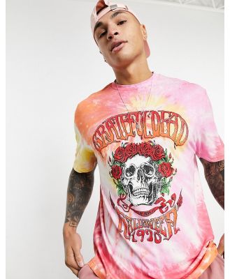 ASOS DESIGN tie-dye T-shirt with Grateful Dead print in pink
