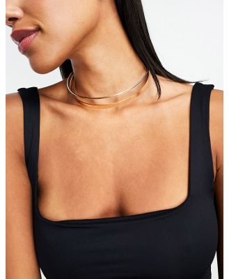 ASOS DESIGN torque choker with double wire design in gold tone